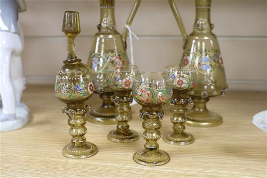 Two Bohemian enamelled glass liqueur jugs and four hock style liqueurs ewer 26cm